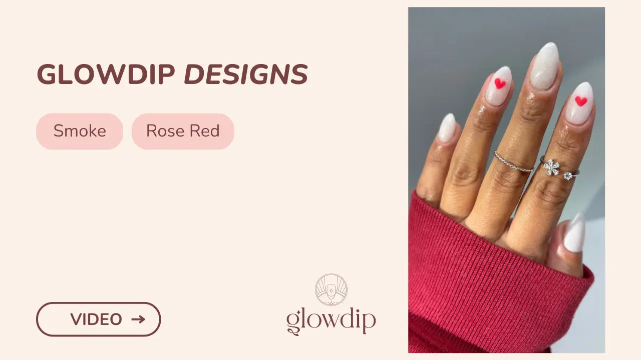 Witte amandelvormige nagels met delicate rode hartjes en een glanzende smoke en rozenrode dipfinish